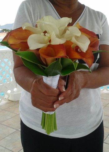 Mango and white Calla lillies