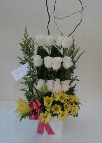 Birthday Exotic 12 White Roses arrangement with yellow daisies accents